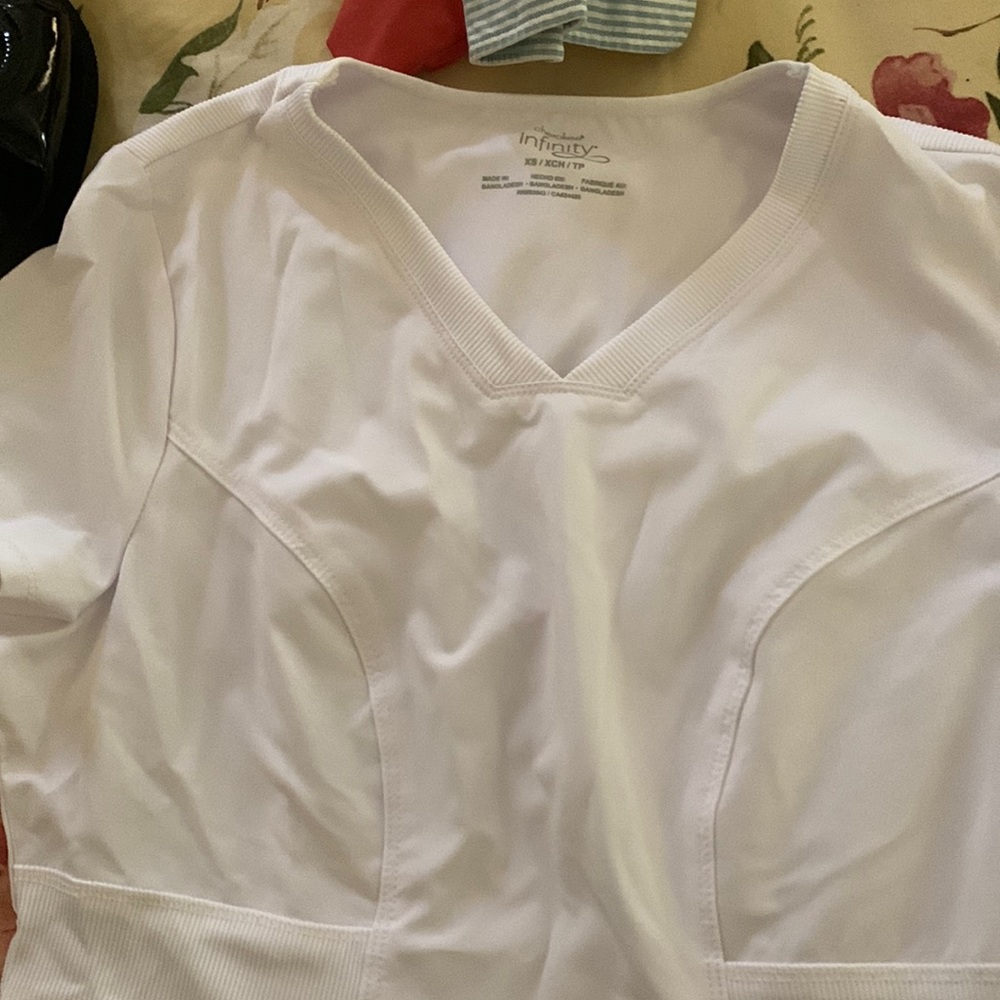 White XS scrub top NWT slight stretch in material